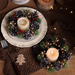 christmas candle holder wreath with pine cones and berries decoration