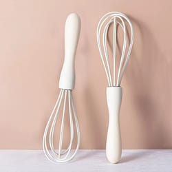 white manual silicone kitchen whisk