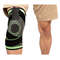 Therapeutic knee brace for pain management