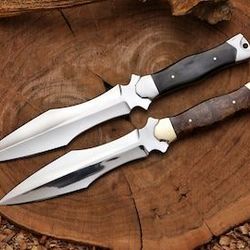 set of 2 damascus daggers | 15" overall, 10" blade, 5" handle | d2 steel blades with brass & steel bolsters | rosewood &