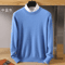 Mens sweater on wooden hanger