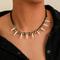 Bohemian Woven Wolf Tooth Necklace 1