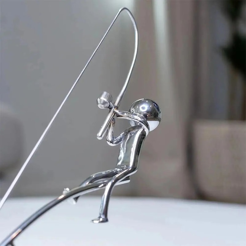 Polished Stainless Steel Fisherman Balancing Sculpture 3