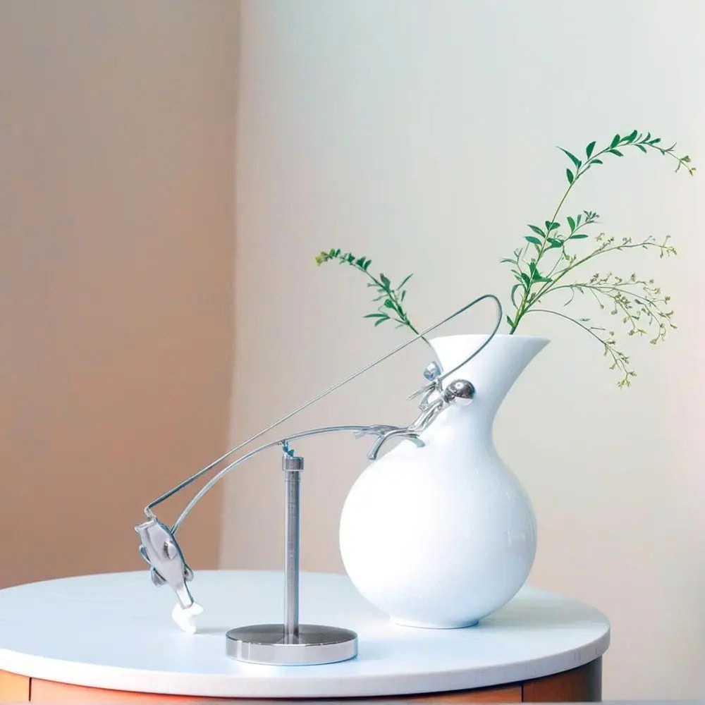 Polished Stainless Steel Fisherman Balancing Sculpture 4