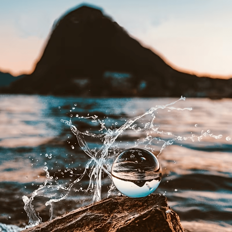 DSLR capturing artistic scene with optical lens ball