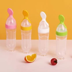 silicone baby feeding bottle with squeeze spoon dispenser