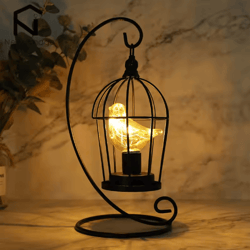 creative birdcage table lamp vintage iron hollow lantern with warm ambient light
