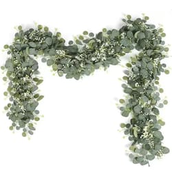 artificial eucalyptus garland with white flowers and berries for home and wedding decor
