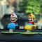 Drift Tail Swing Rotating Car Ornament Dashboard Decoration Toy 15
