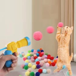 interactive cat ball launcher toy with plush balls