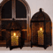 Elegant Black Metal Hanging Candle Lantern Set Hollow Pattern Ambient Decor 1