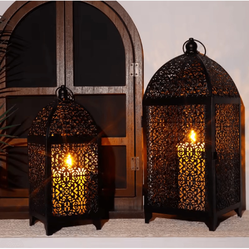 Elegant Black Metal Hanging Candle Lantern Set Hollow Pattern Ambient Decor 1