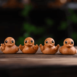 hand-carved wooden duck figurine – cute solid wood desk ornament