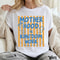 Christian Mom TShirt Unisex GarmentDyed Tee Motherhood Is Kingdom Work Mama Gift Stripes Preppy Coq 3