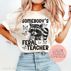 comfort colors somebodys feral teacher shirt | raccoon butterfly teacher graphic tee
