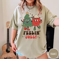 cute christmas shirt with jolly characters. fun holiday graphic tee perfect for festive outfits and gifts.