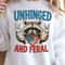 Unhinged And Feral Raccoon 4th Of July Funny Graphic Tee 1