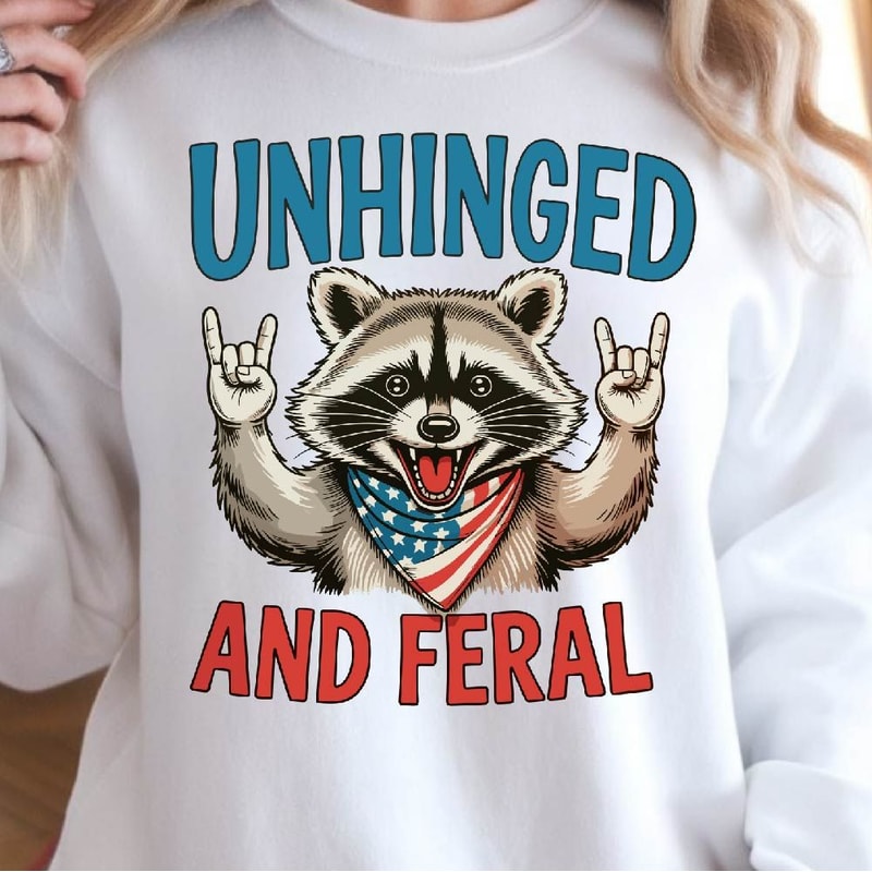 Unhinged And Feral Raccoon 4th Of July Funny Graphic Tee 1