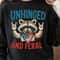 Unhinged And Feral Raccoon 4th Of July Funny Graphic Tee 0