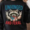 Unhinged And Feral Raccoon 4th Of July Funny Graphic Tee 0