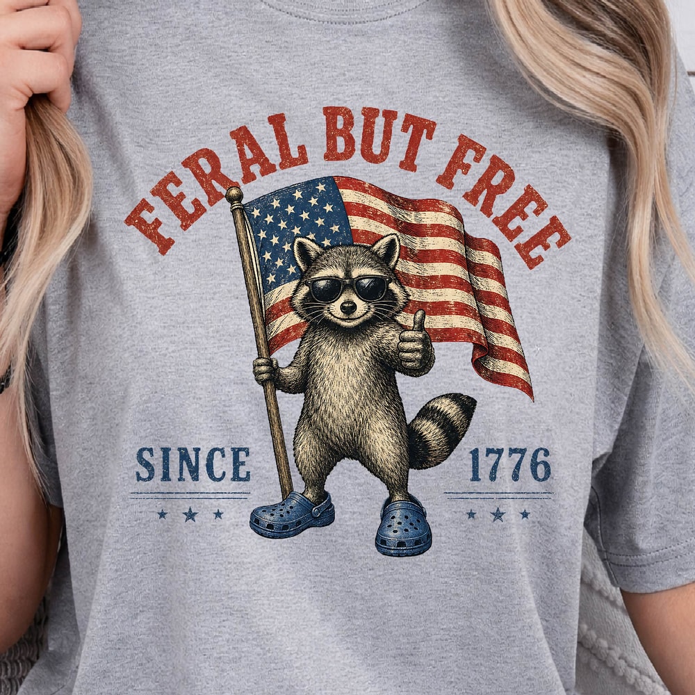 Feral But Free Raccoon 4th Of July Patriotic Graphic Tee 1