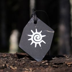 Spiral Sun pendant made of shungite