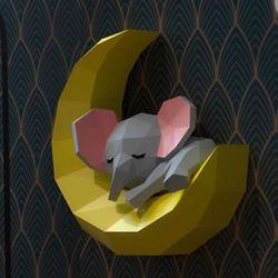 papercraft elephant on the moon