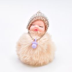 pompom sleeping baby doll keychain, brand new