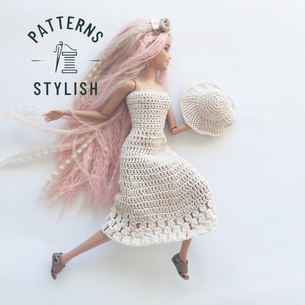 Barbie doll wearing a crochet boho hat and dress