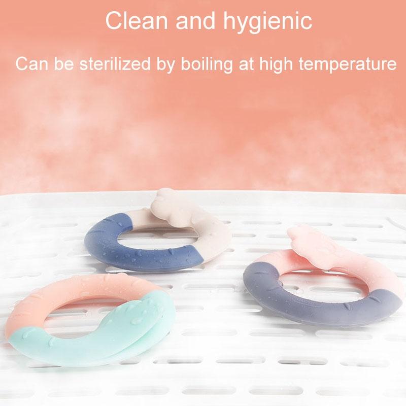 Silicone Baby Teether Toy Safe Gum Relief Infant Teething Ring With Easy Grip Design 7