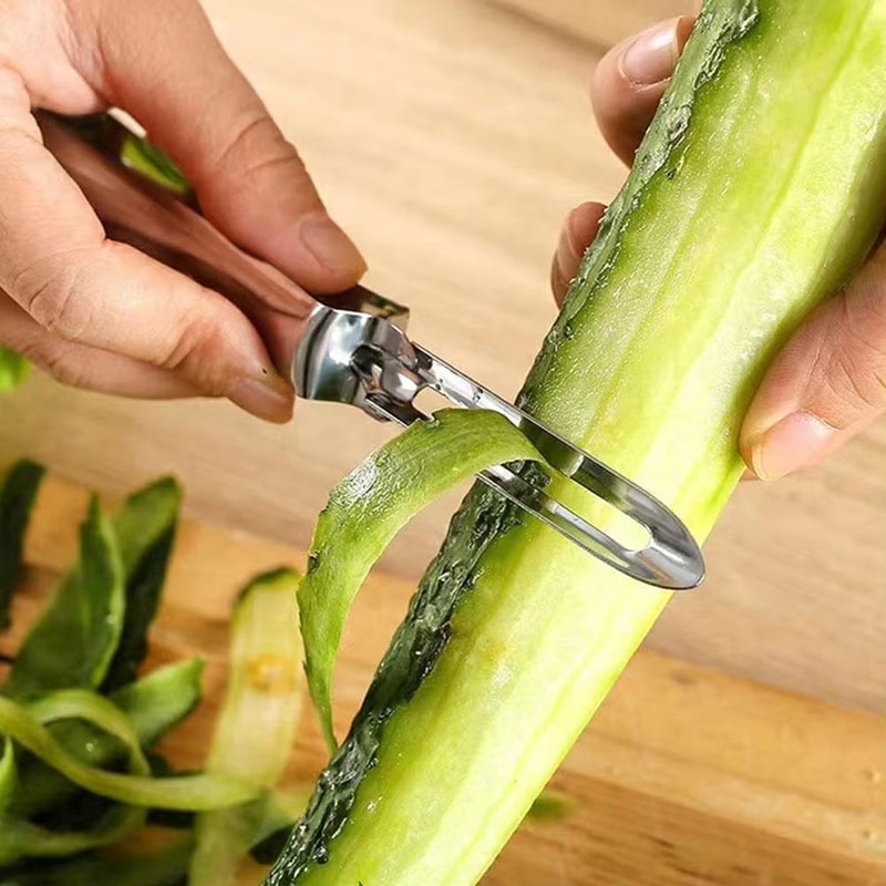 Stainless Steel Vegetable Peeler and Fruit Slicer with Ergonomic Grip