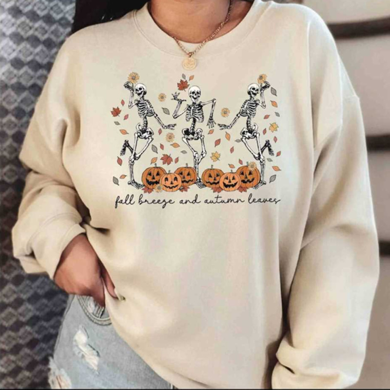 MR2710202312816fallbreezeandautumnleavessweatshirtskeletonpumpkinimage1jpg