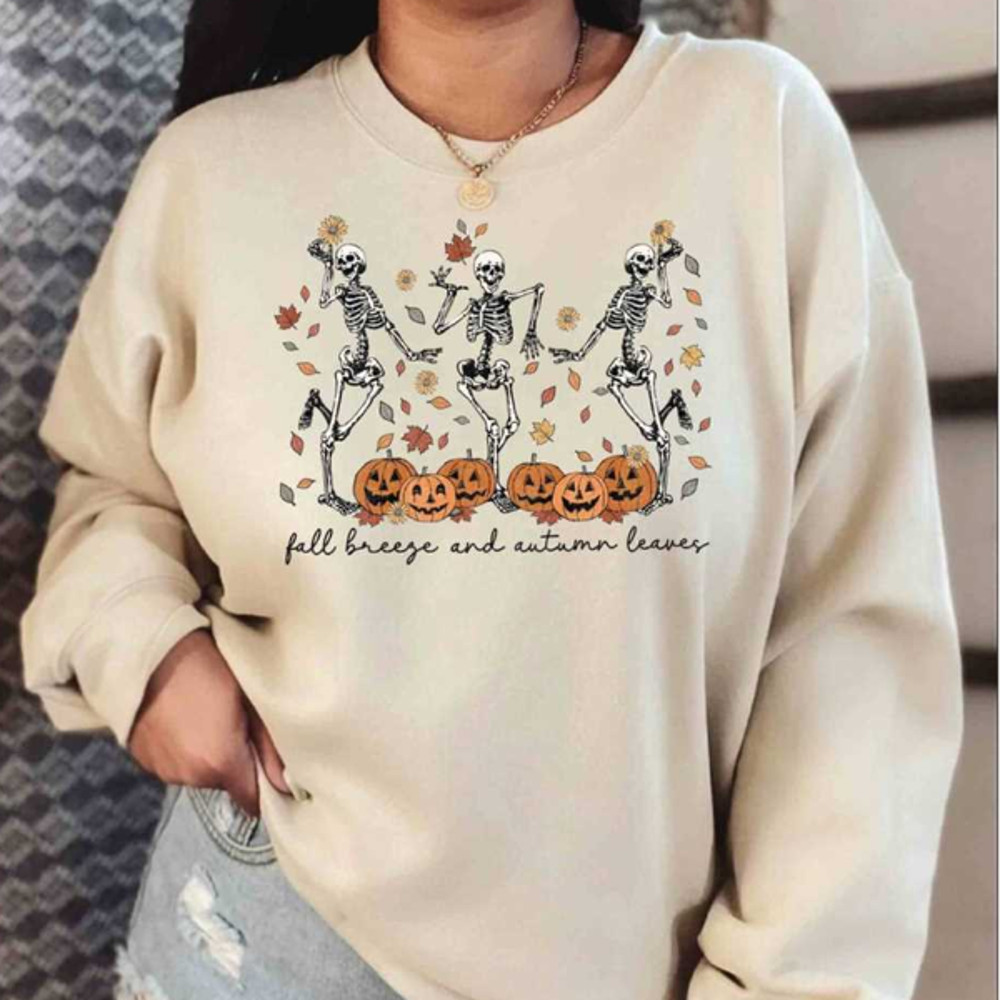 MR2710202312313fallbreezeandautumnleavessweatshirtskeletonpumpkinimage1jpg