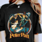 MR2442023174754retro90sdisneypeterpandarlingflightneverlandshirtimage1jpg