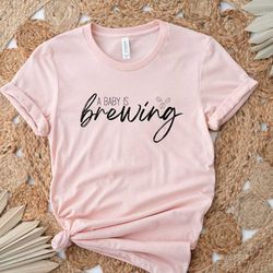 a baby is brewing,pregnancy announcement,funny mama tshirt,pregnancy reveal tshirt,pregnant sister gifts,maternity tshir