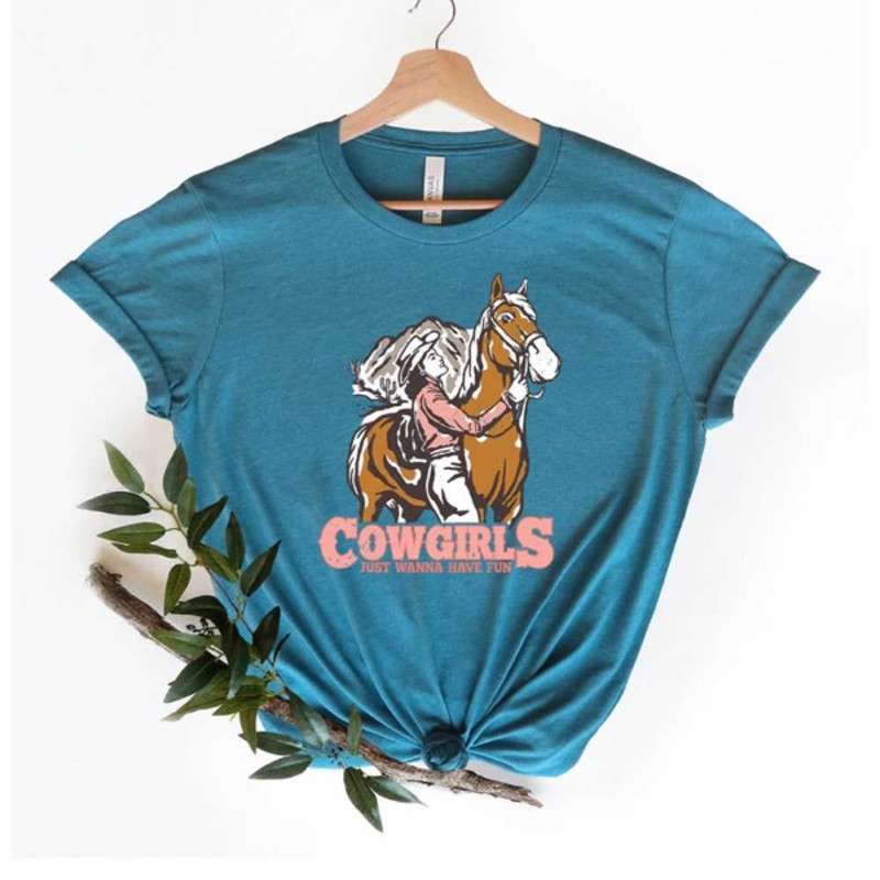 MR24102023151021cowgirlsjustwannahavefuncowgirlridinghorsewesternimage1jpg