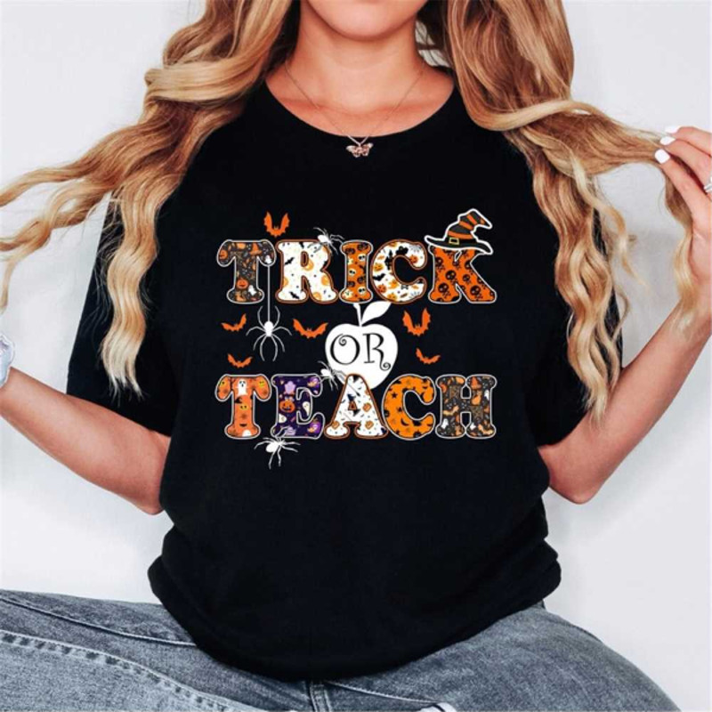 MR2510202394226halloweenteachertshirttrickorteachshirtfunnyimage1jpg