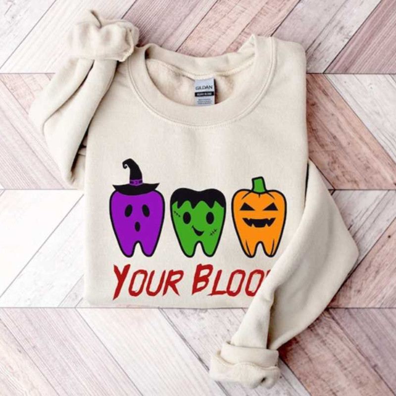 MR2610202317527yourbloodsweaterspookyteethhoodiedentisthalloweenimage1jpg