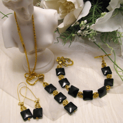 black and gold jewelry set of pendant necklace, bracelet and earrings, black and gold crystal glass jewelry set