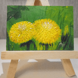 Oil miniature of yellow dandelions