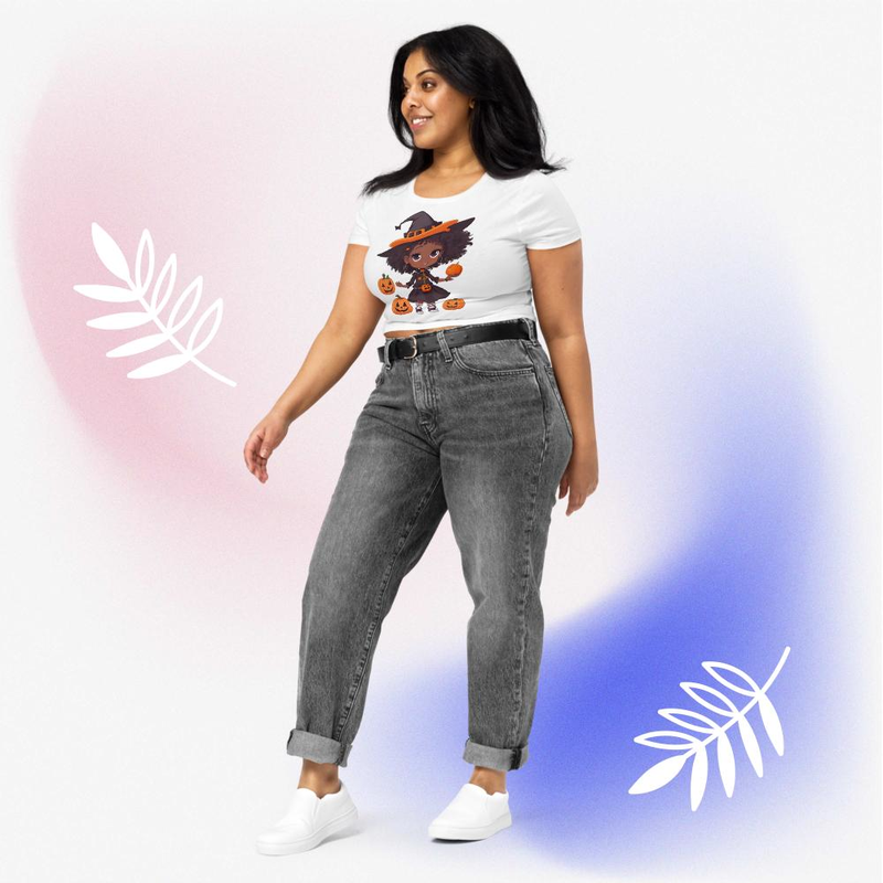 Pumpkin halloween Beautiful girl wearing a witches hat And around it the pumpkin Women’s Crop Tee