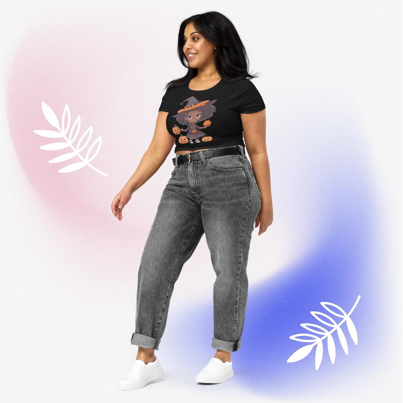 Pumpkin halloween Beautiful girl wearing a witches hat And around it the pumpkin Women’s Crop Tee