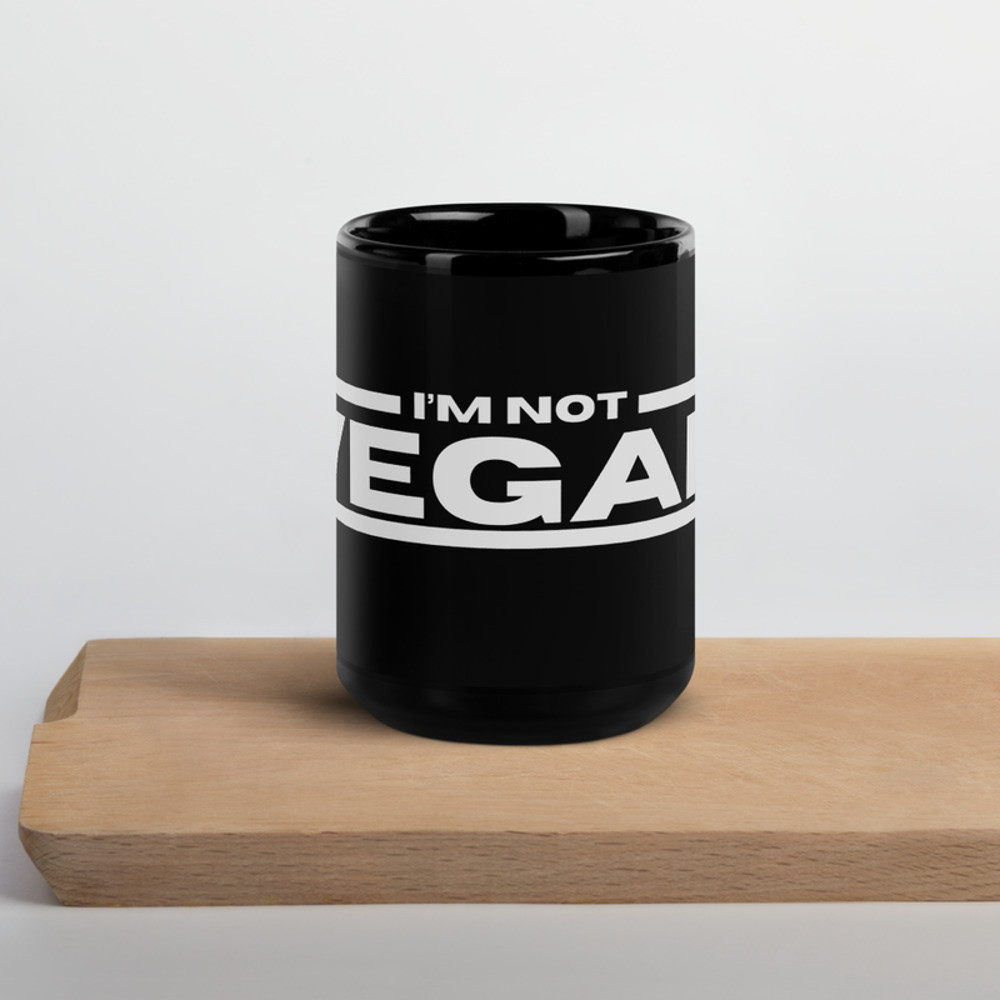Black Glossy Mug with print: "I'm NOT Vegan"