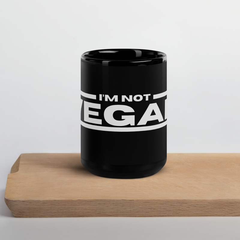 Black Glossy Mug with print: "I'm NOT Vegan"