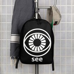 Looking Is Not Seeing Printed with Mysterious Eye Logo Minimalist Backpack