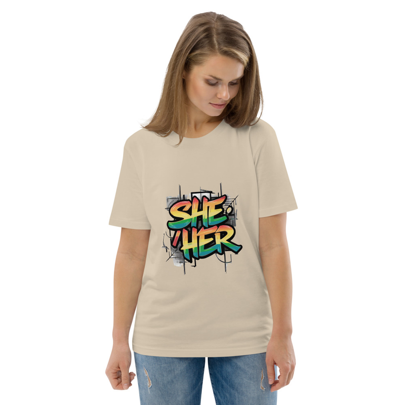 Unisex organic cotton t-shirt featuring the words "she/her"