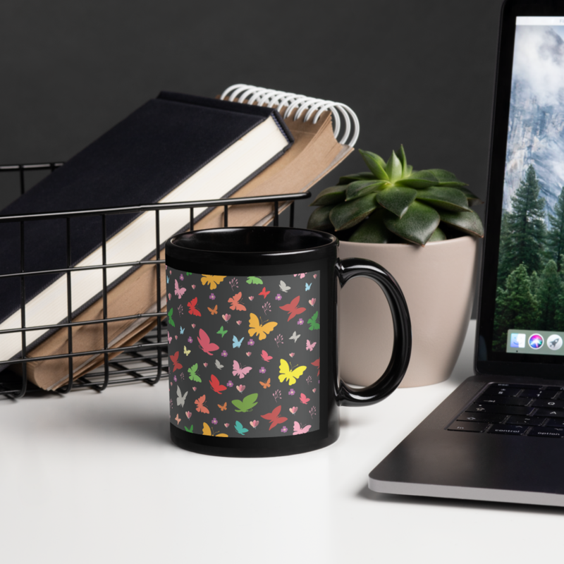 Rainbow colored butterflies on a dark background black glossy coffee mug