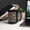 Rainbow colored butterflies on a dark background black glossy coffee mug