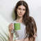 Kiwi slices on a striped background coffee mug