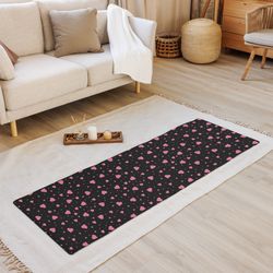 pink hearts on the black background yoga mat